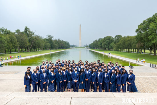 USA Pavilion at Exo 2020 Dubai Youth Ambassadors pose in front of the Washington Monument in Washington, DC