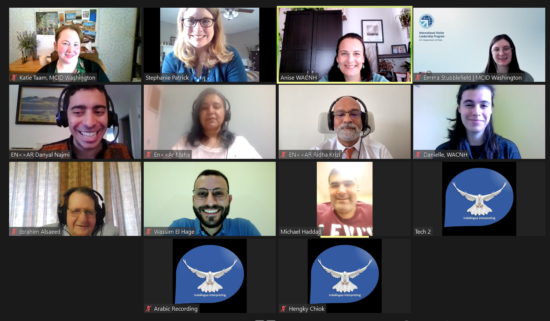 Group of people smiling on Zoom.