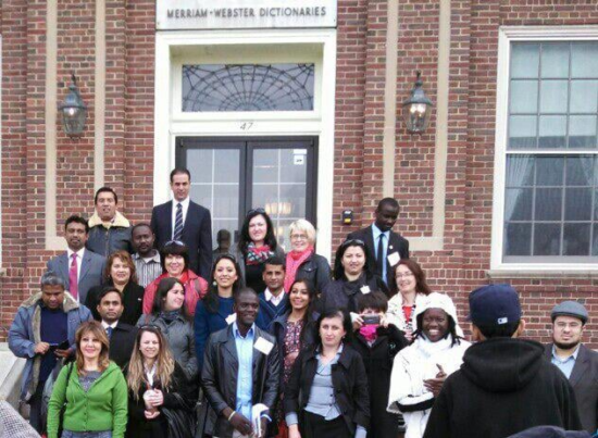 Group of people standing outside Merriam-Webster Dictionaries